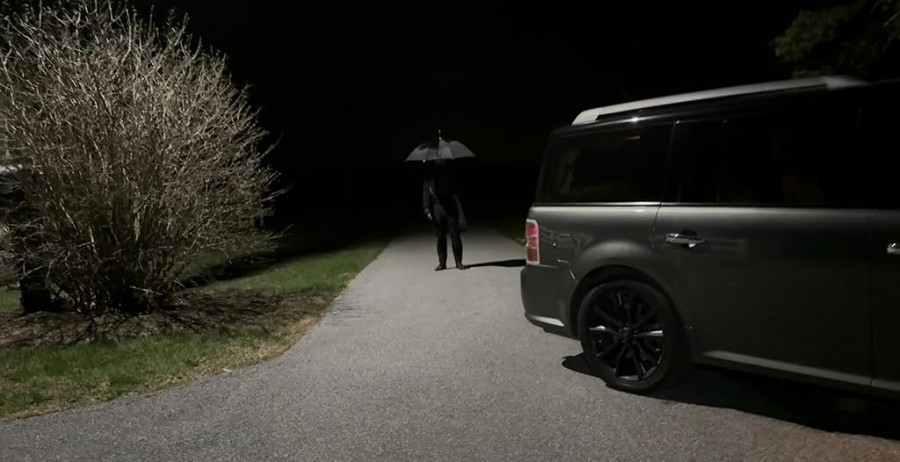 The Man With The Black Umbrella